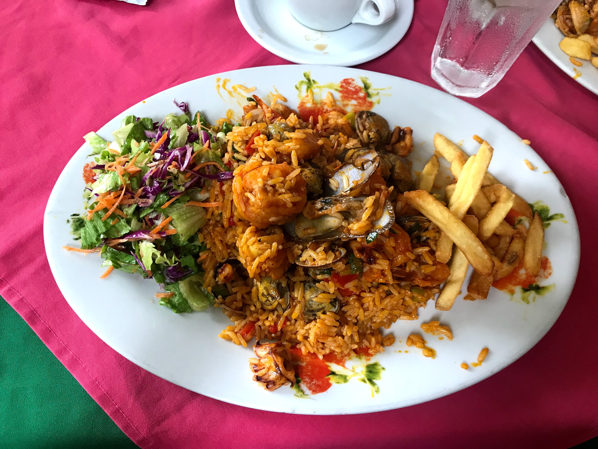  Another funny combo - Seafood Paella Special with french fries & salad! This was our meal in Montezuma after a full day at Cabo Blanco. The mussels were so fresh and although the meal was non-traditional, we enjoyed the fun mixture of the special the locals created. 